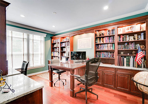 Home office with desk and bookshelves set up by our full home renovation company near West McLean, Virginia.